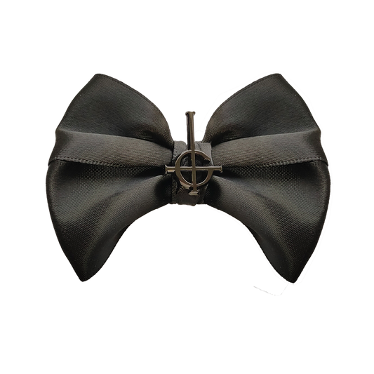 Channel the essence of Ghost with the Grucifix Bow featuring the iconic Grucifix metal charm at its center. Perfect for concerts or everyday wear, this statement accessory adds a subtle yet bold touch to any outfit. 