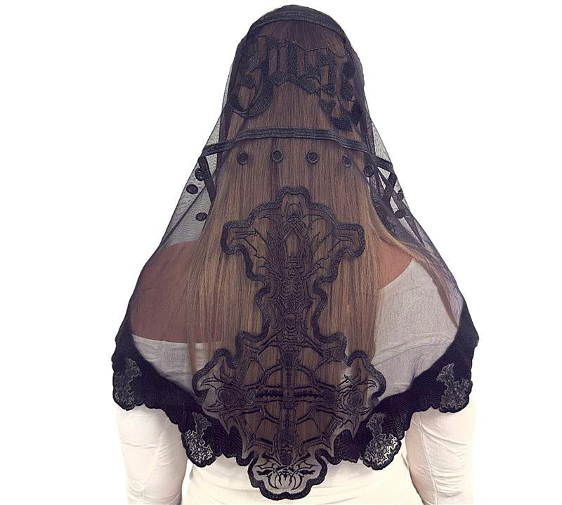 Black lace veil with intricate design on a white background