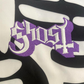 Close up image of an embroidered Ghost Purple logo.