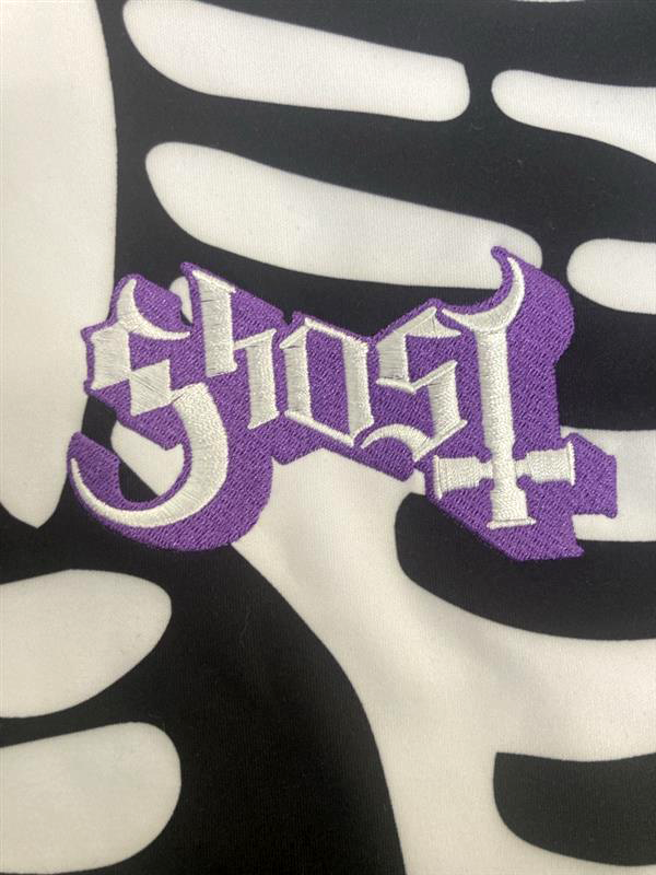Close up image of an embroidered Ghost Purple logo.