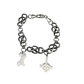 Black chain bracelet with two charms on a white background