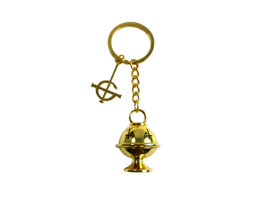 Gold bell-shaped keychain with a small symbol on a white background