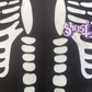 Ghost Skeleton Onesie with embroidered Ghost Logo on the front.