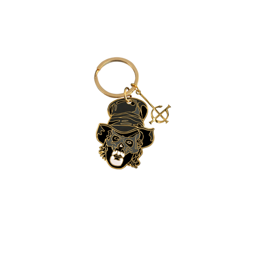 Keychain with skull design and top hat on a white background